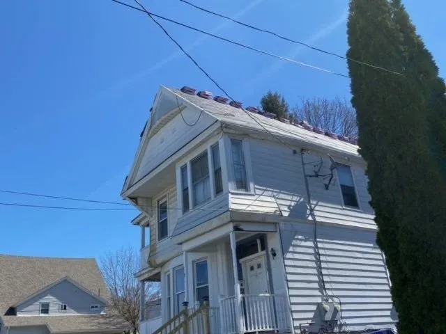 Slide of Masana Roofing & Construction