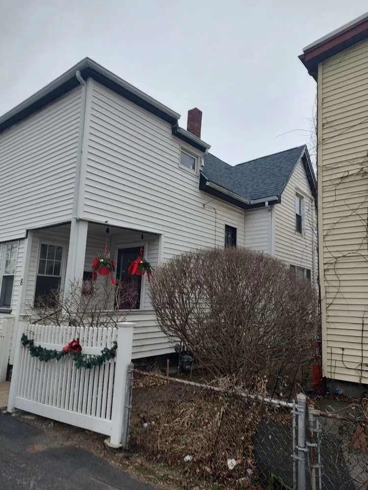 Slide of Mass Gutters And Roofing