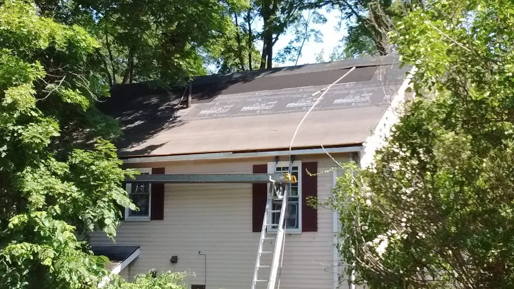Slide of Mass Gutters And Roofing