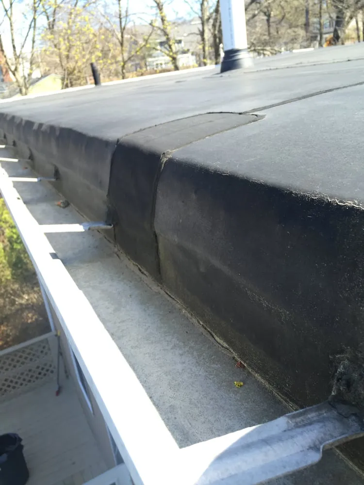 Slide of Mass Gutters And Roofing