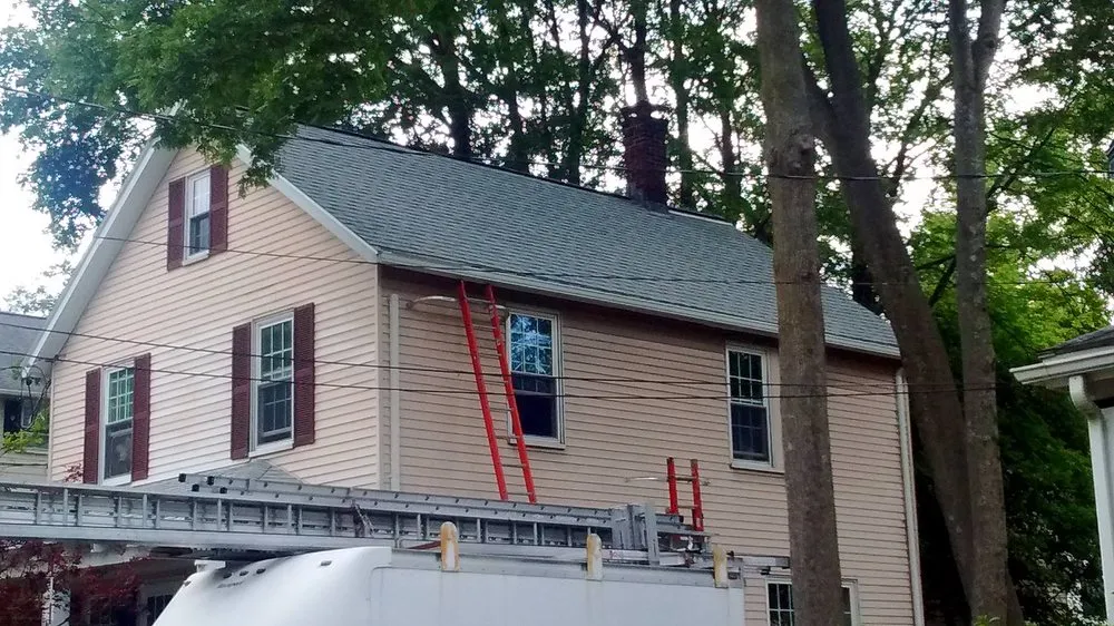 Slide of Mass Gutters And Roofing