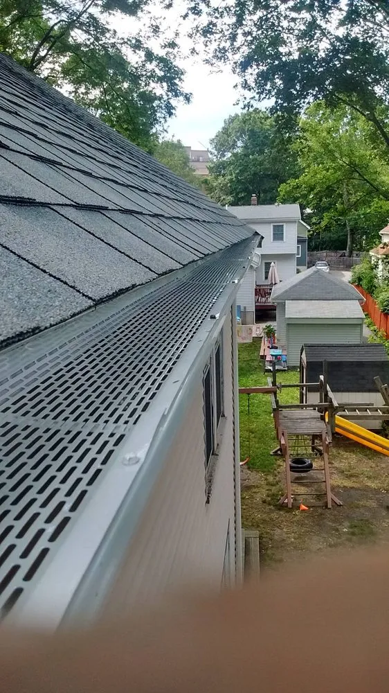 Slide of Mass Gutters And Roofing