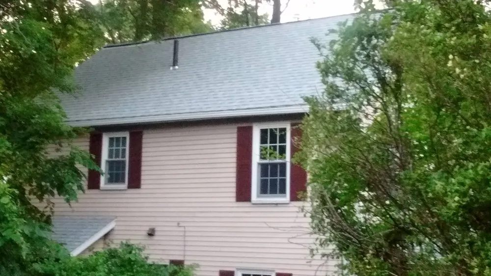 Slide of Mass Gutters And Roofing