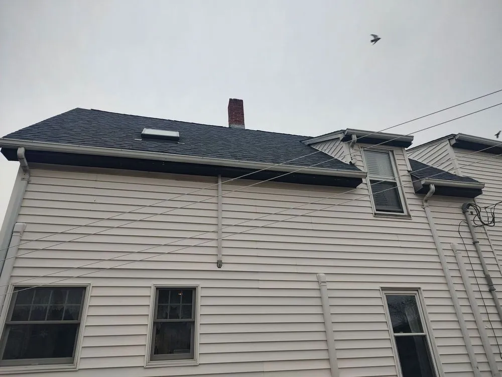 Slide of Mass Gutters And Roofing