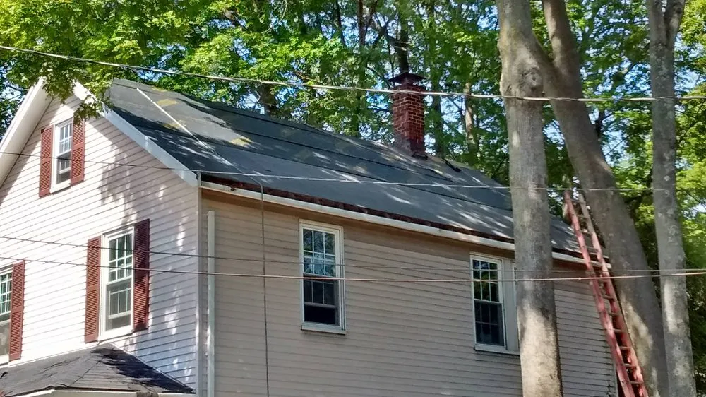 Slide of Mass Gutters And Roofing