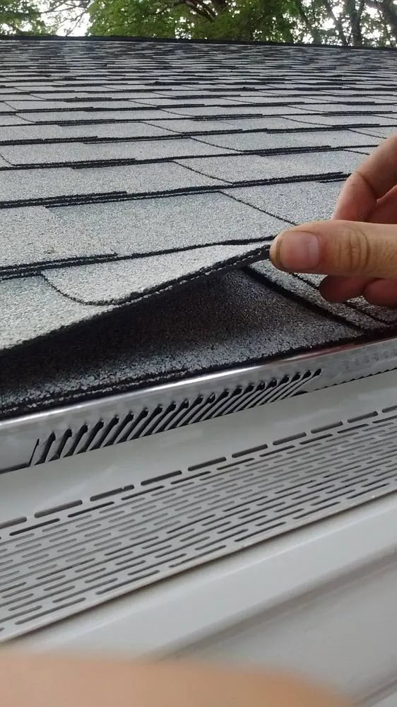 Slide of Mass Gutters And Roofing