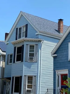 Mass Roofing And Gutters Logo