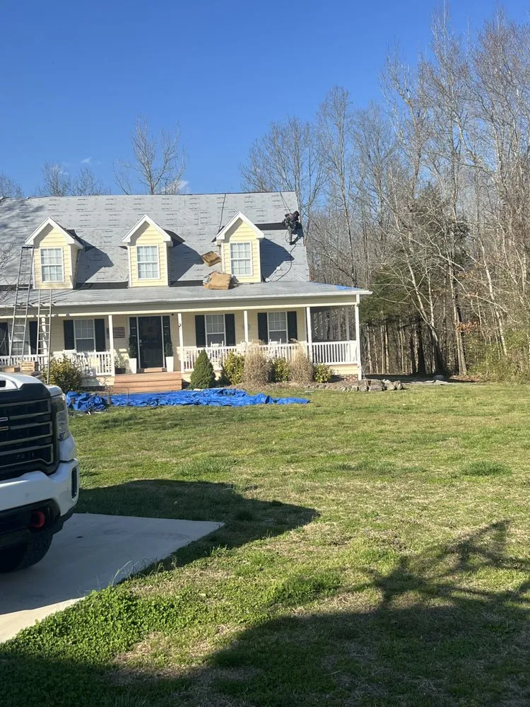 Slide of Massey Roofing