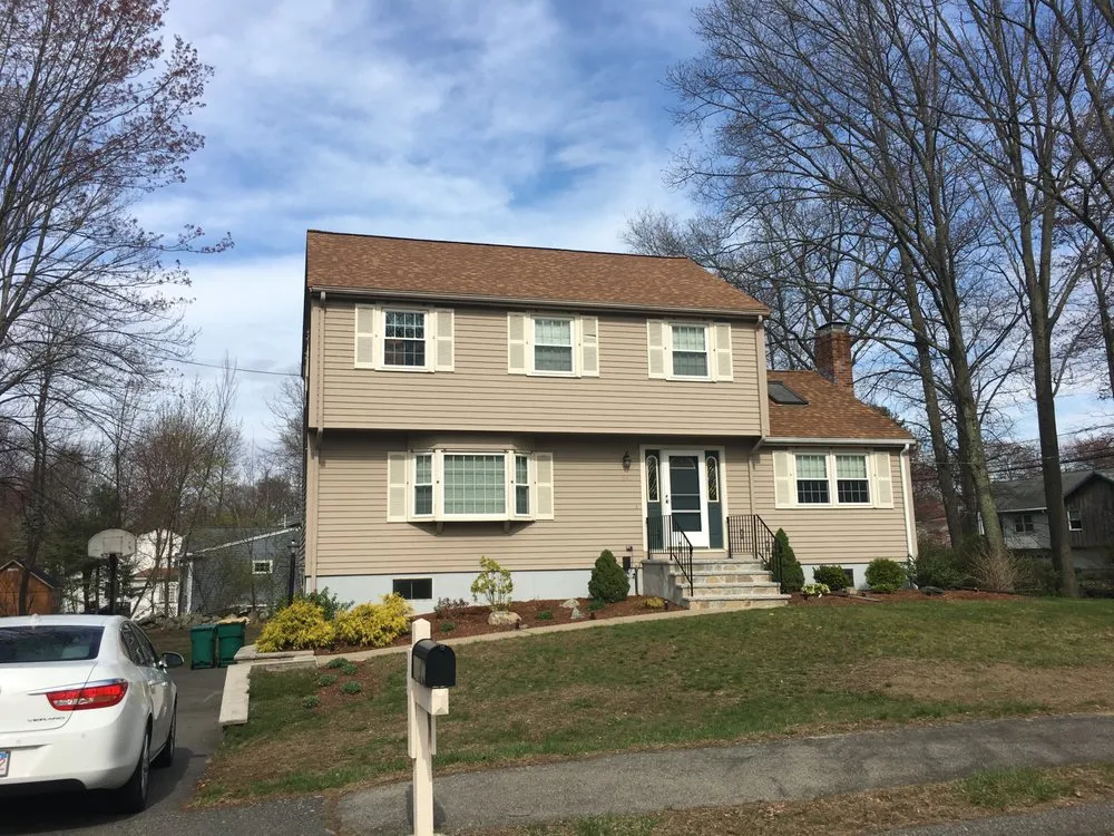 Slide of MassTech Roofing and Building