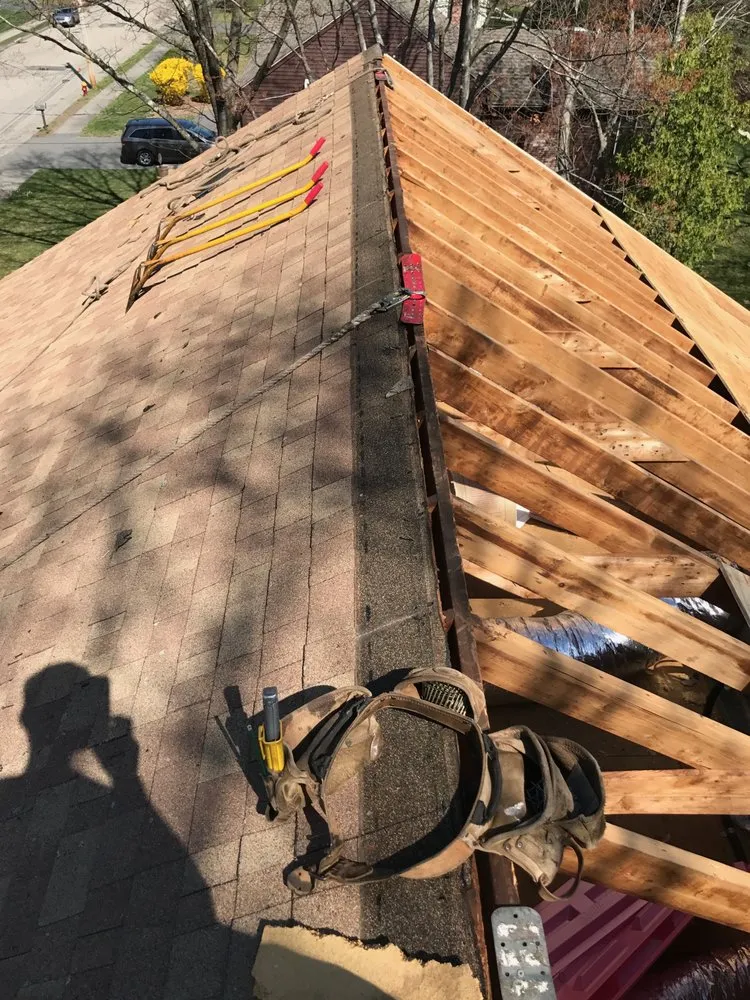 Slide of MassTech Roofing and Building