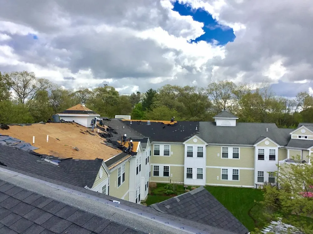 Slide of MassTech Roofing and Building