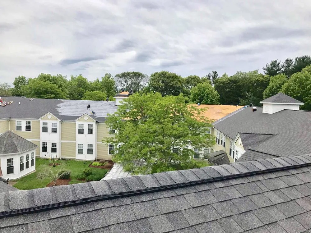 Slide of MassTech Roofing and Building