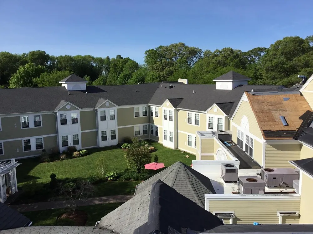 Slide of MassTech Roofing and Building