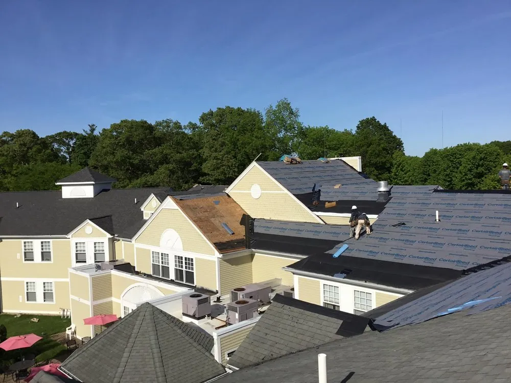 Slide of MassTech Roofing and Building