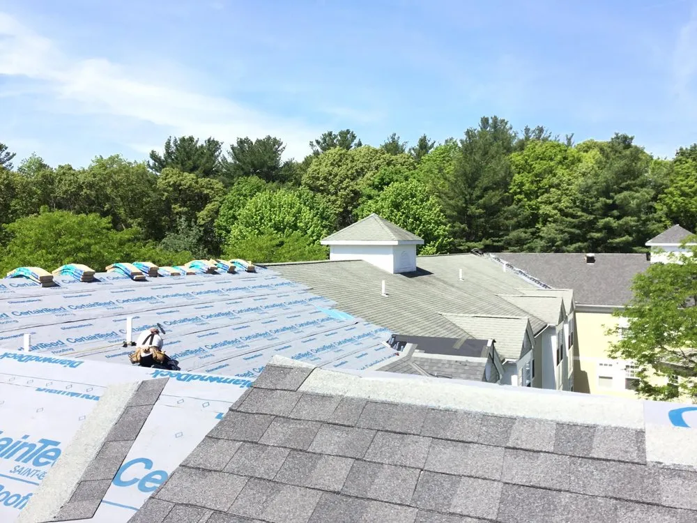 Slide of MassTech Roofing and Building