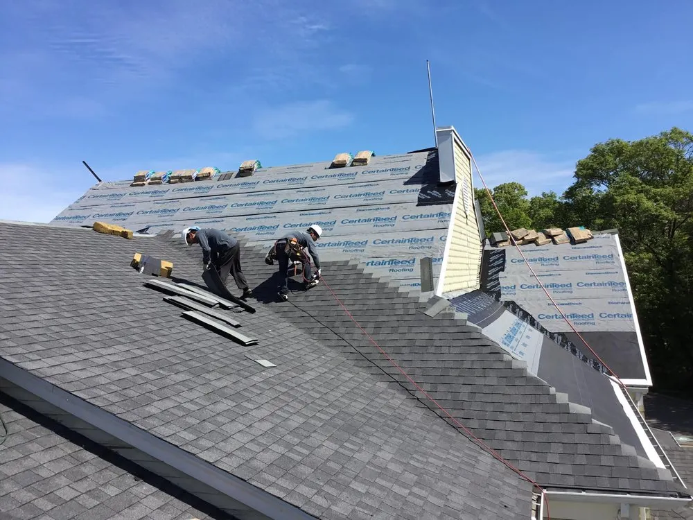 Slide of MassTech Roofing and Building