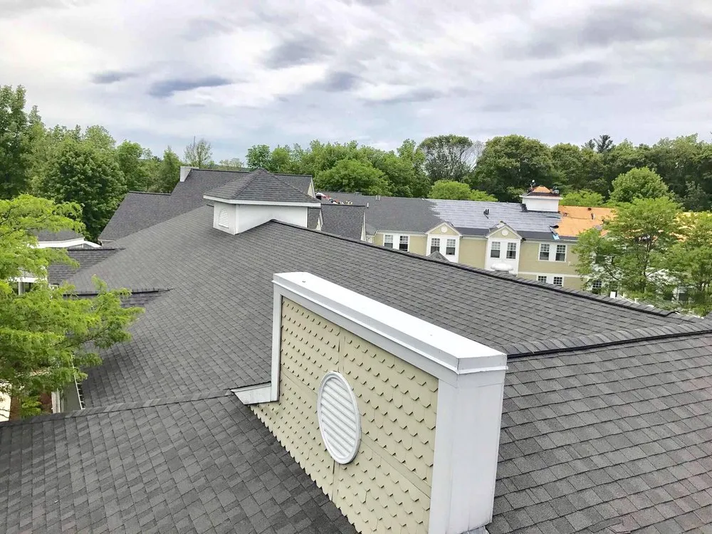 Slide of MassTech Roofing and Building