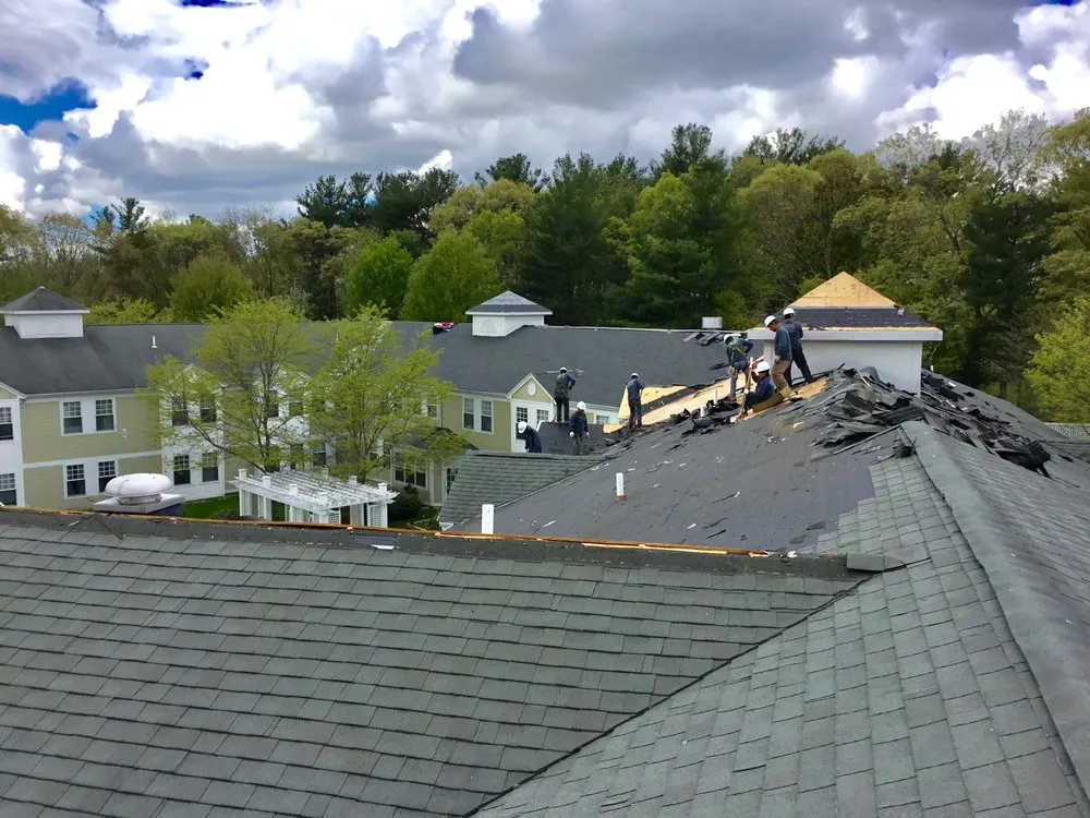 Slide of MassTech Roofing and Building