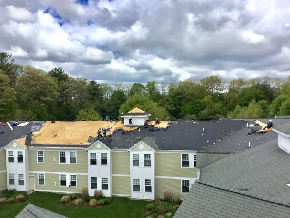 Slide of MassTech Roofing and Building