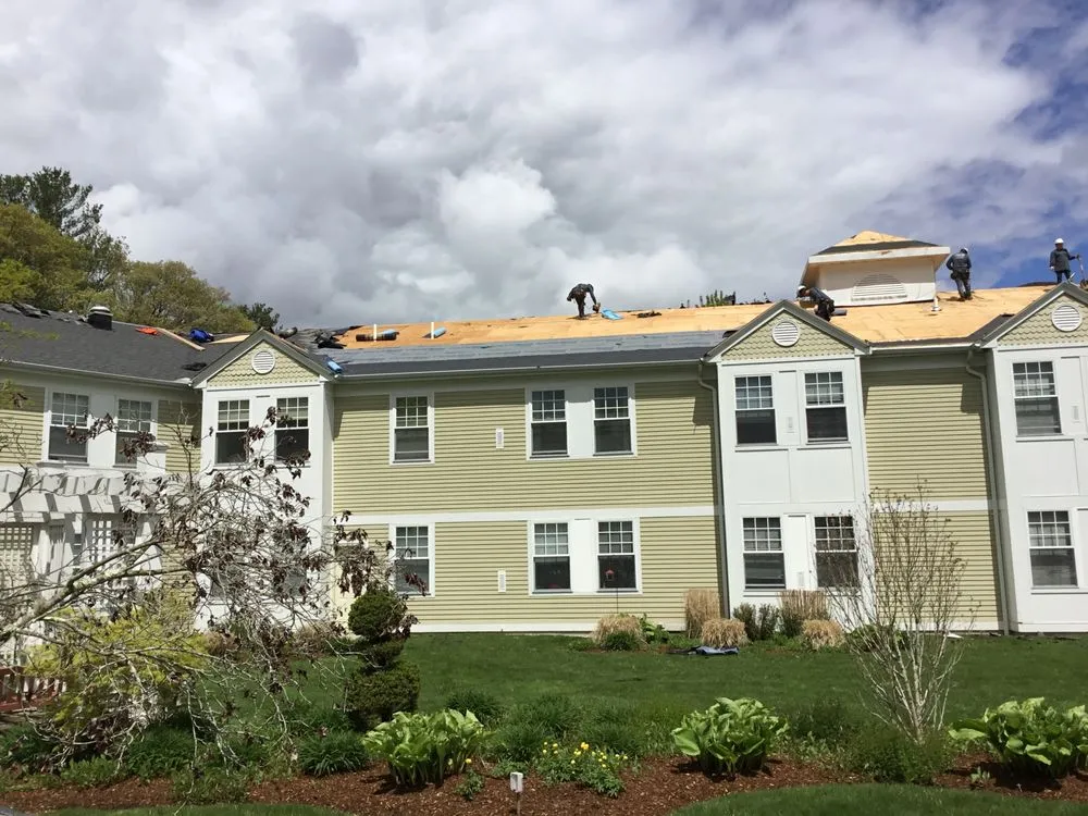 Slide of MassTech Roofing and Building