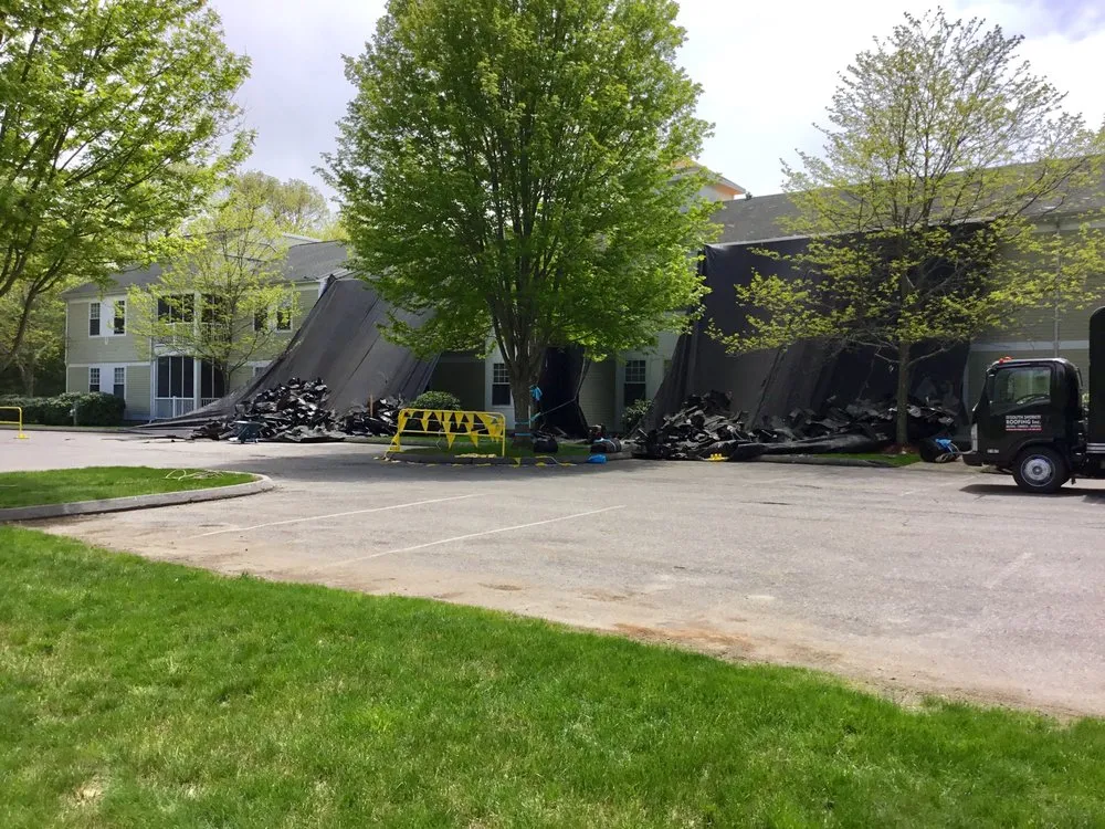 Slide of MassTech Roofing and Building