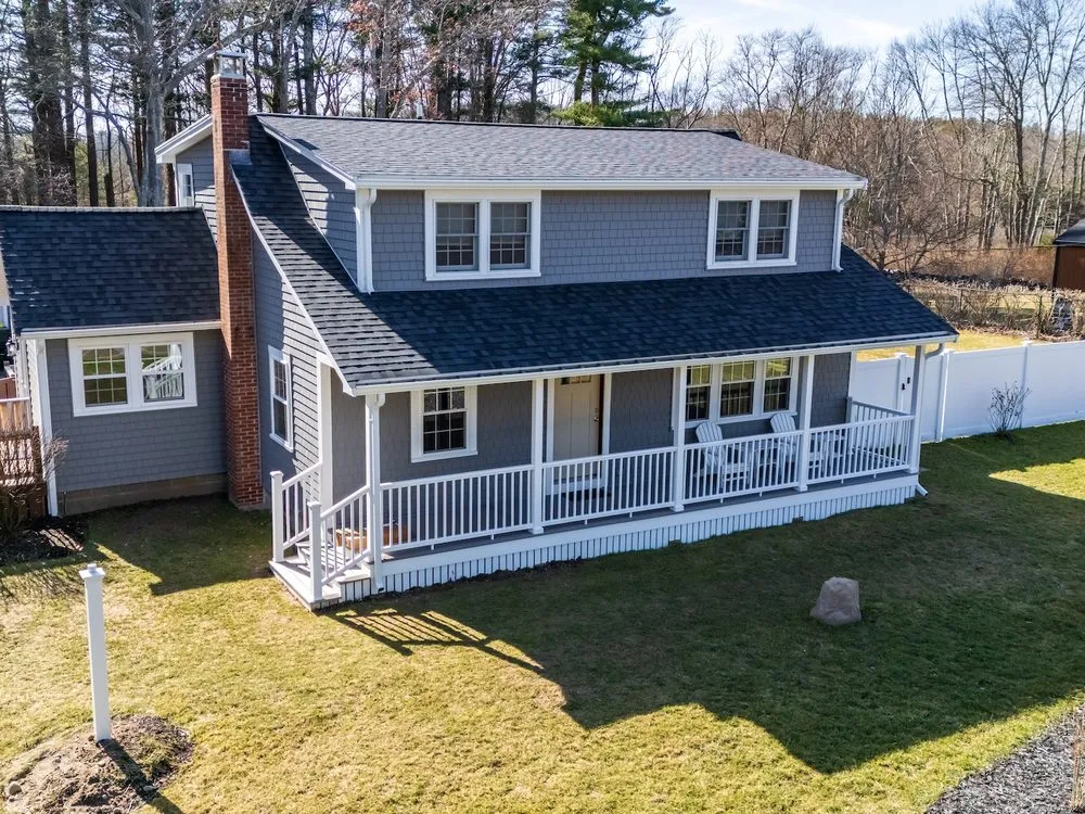 Slide of MassTech Roofing and Building