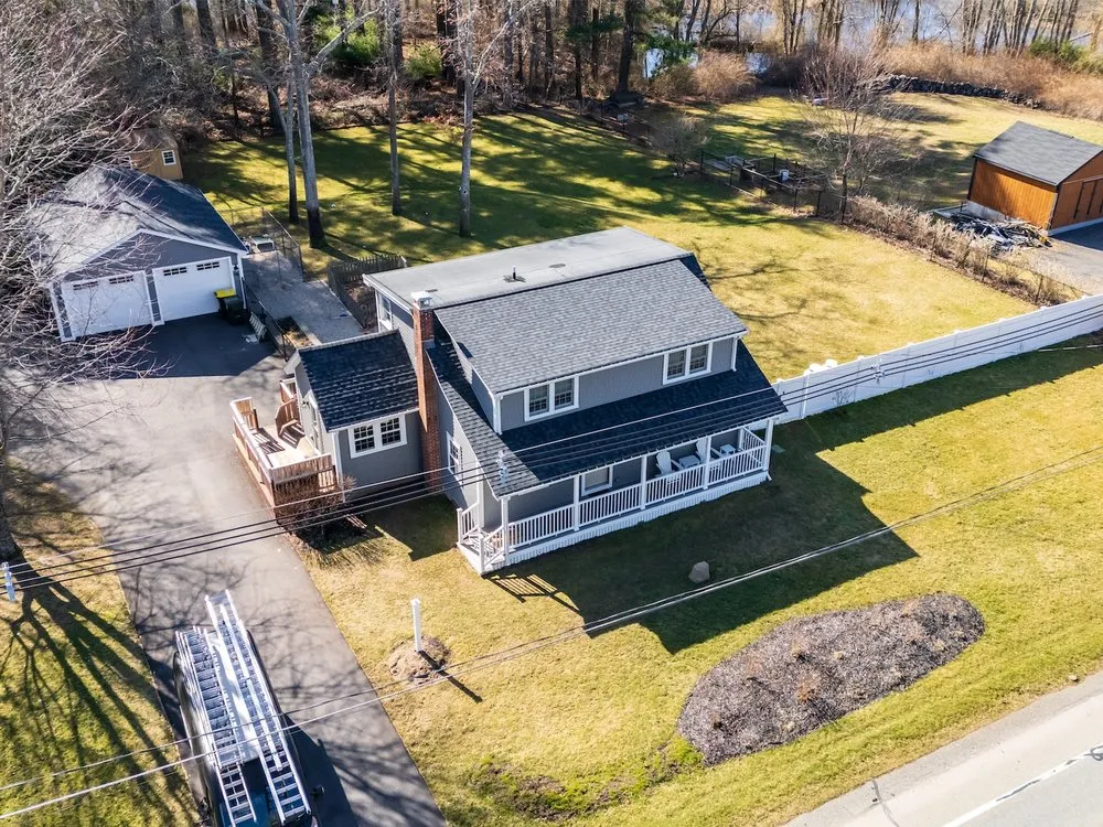 Slide of MassTech Roofing and Building