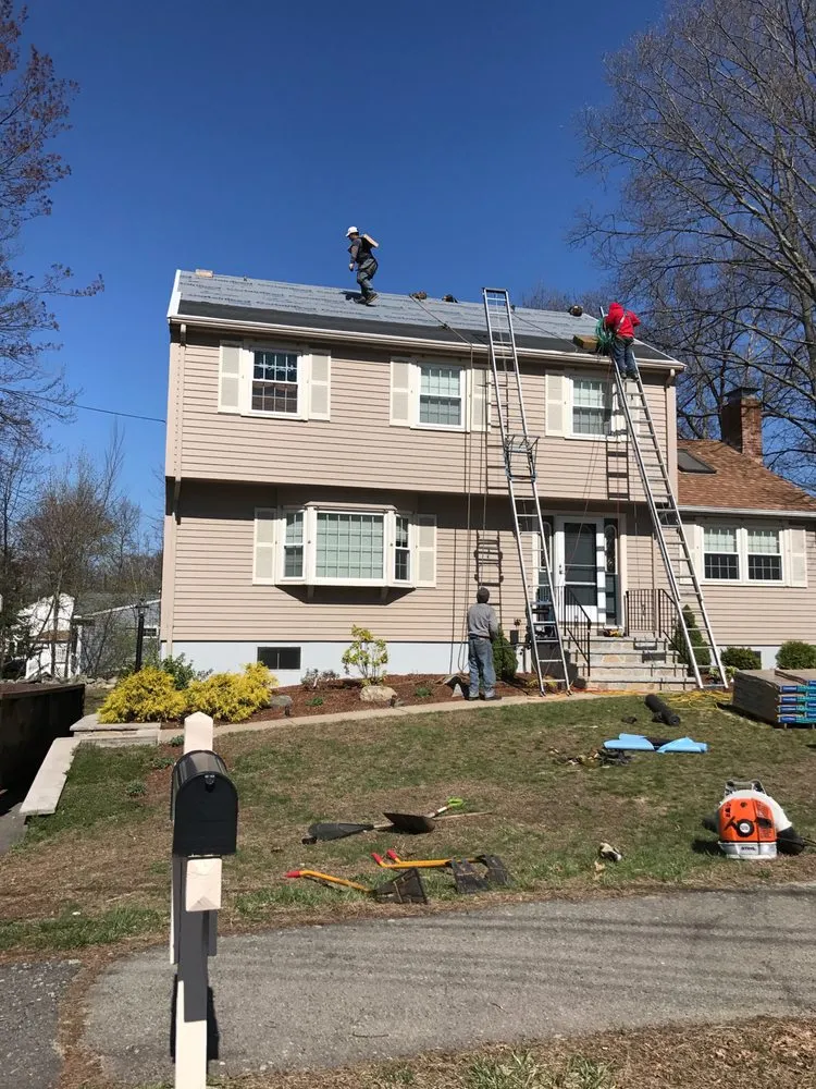 Slide of MassTech Roofing and Building