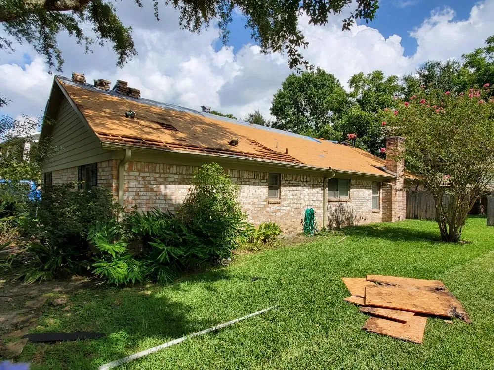 Slide of Mast Roofing & Construction