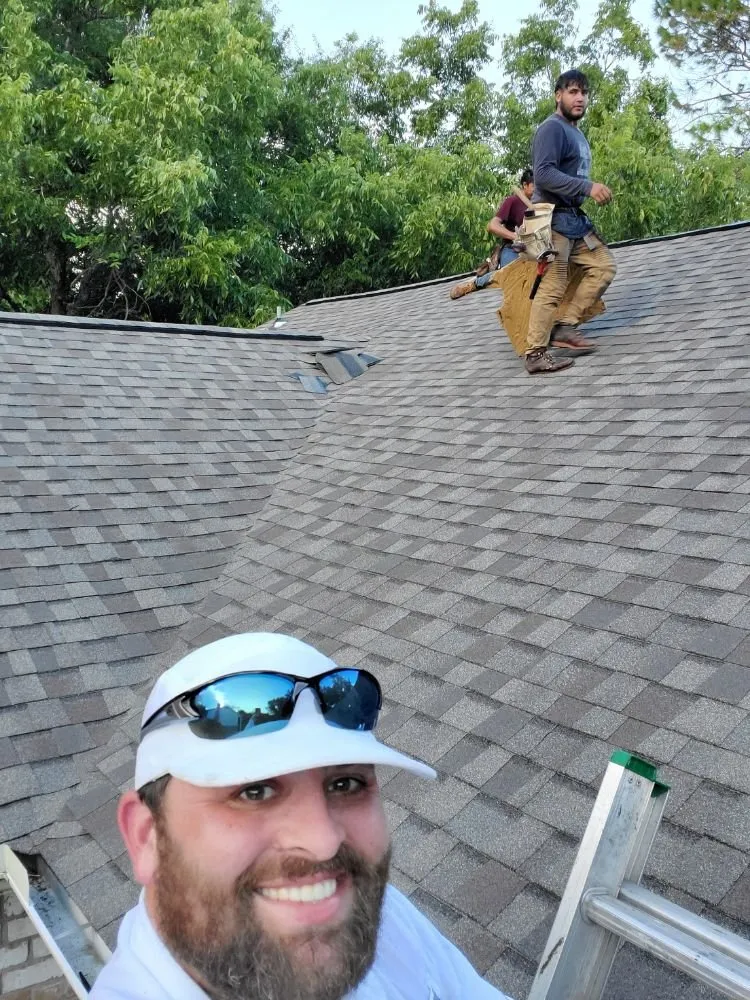 Slide of Mast Roofing & Construction