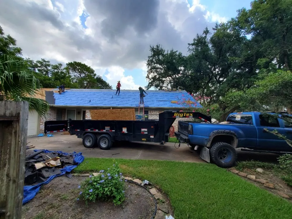 Slide of Mast Roofing & Construction