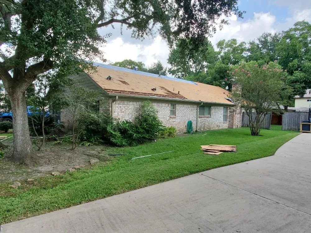 Slide of Mast Roofing & Construction