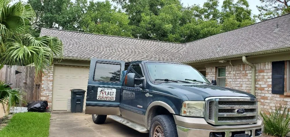 Slide of Mast Roofing & Construction