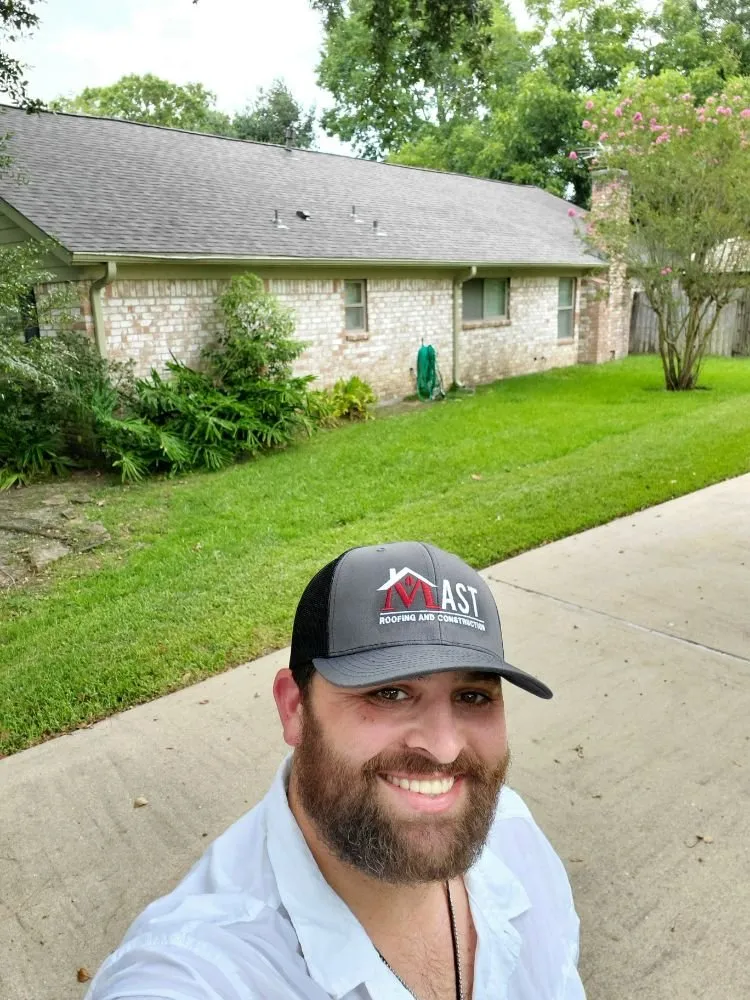 Slide of Mast Roofing & Construction