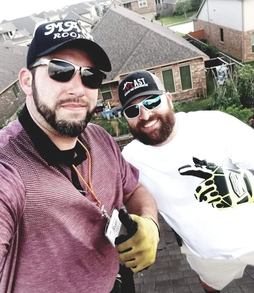 Slide of Mast Roofing & Construction