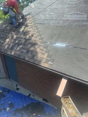 Masterpiece Roofing & Construction Logo