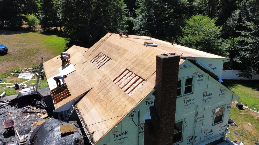 Slide of Masterpiece Roofing