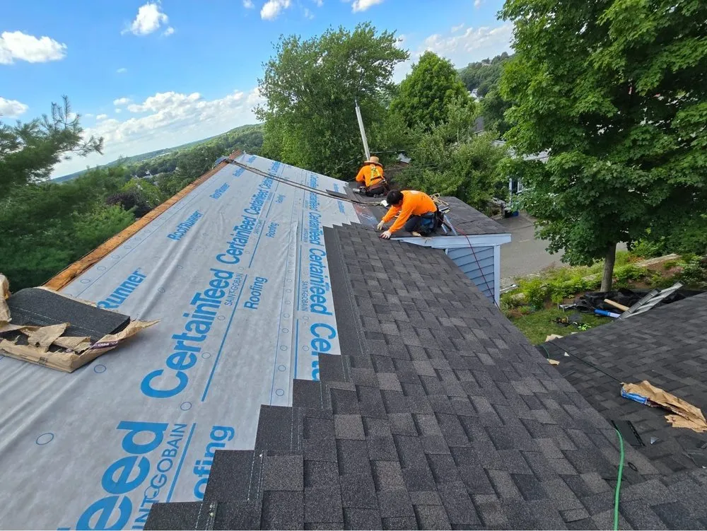 Slide of Masterpiece Roofing