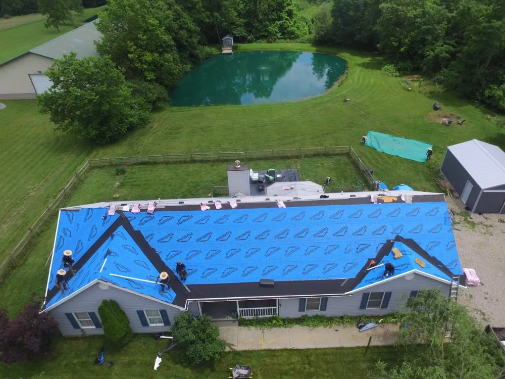 Slide of MasterRoof Contracting