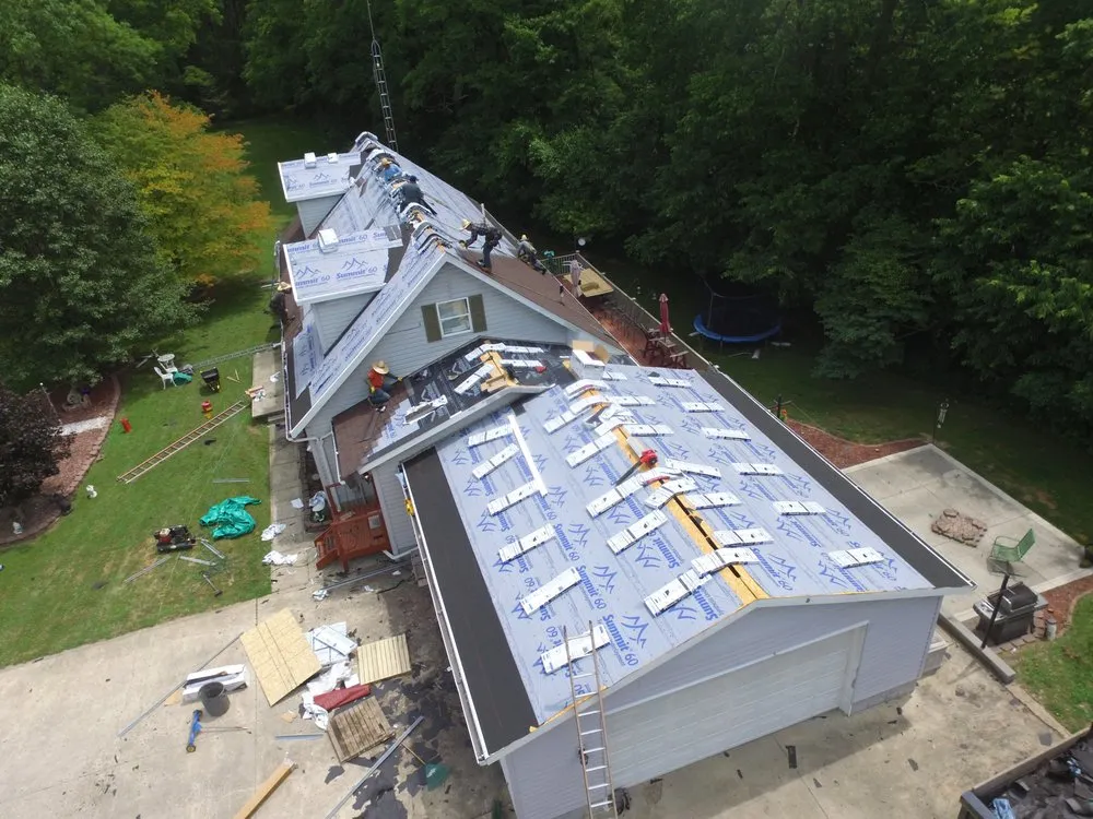 Slide of MasterRoof Contracting
