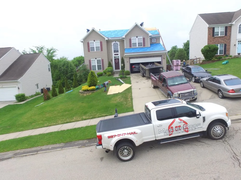 Slide of MasterRoof Contracting