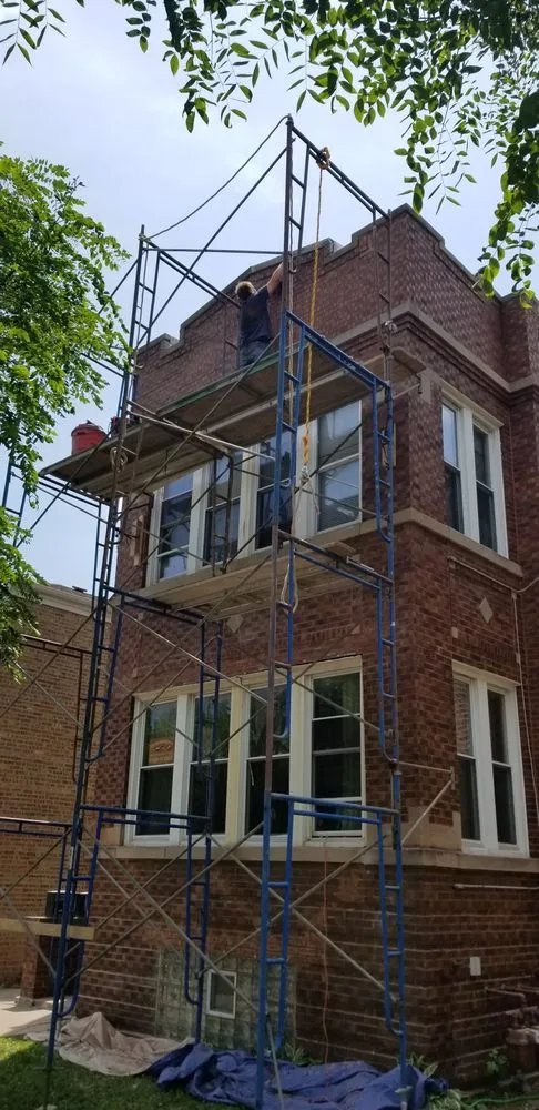 Slide of Masters Elite Roofing And Tuckpointing