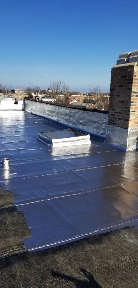 Slide of Masters Elite Roofing And Tuckpointing