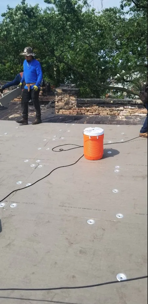 Slide of Masters Elite Roofing And Tuckpointing