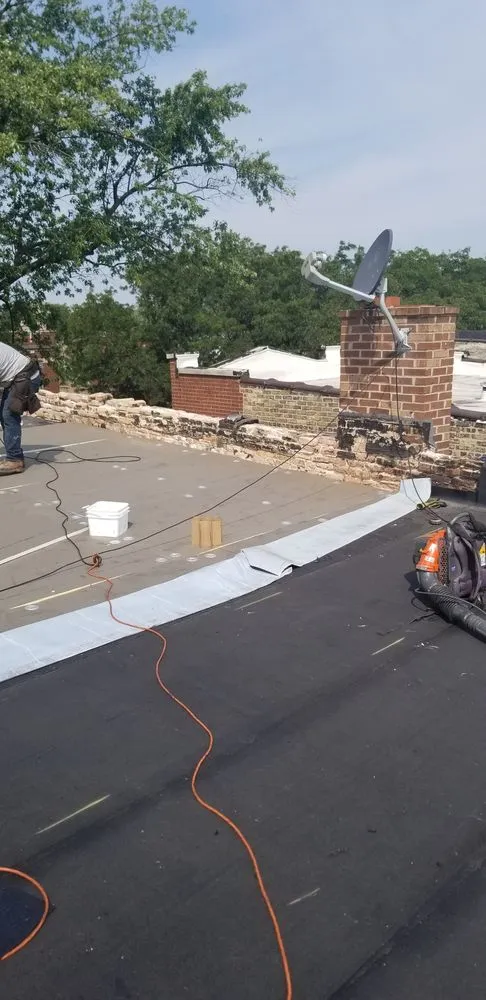 Slide of Masters Elite Roofing And Tuckpointing