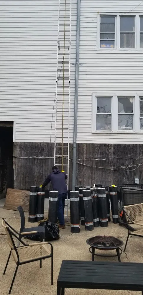 Slide of Masters Elite Roofing And Tuckpointing