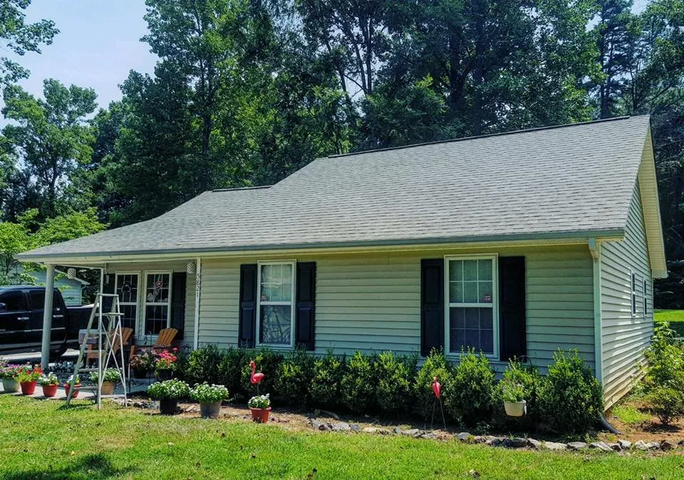 Slide of Masters Roofing