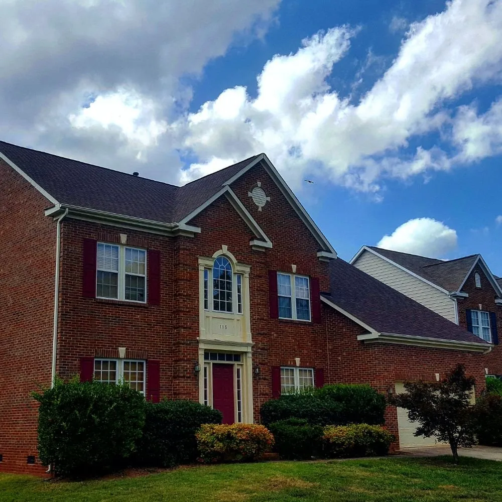 Slide of Masters Roofing