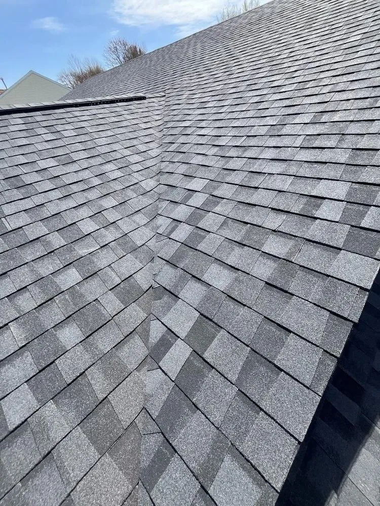 Slide of Masters Roofing