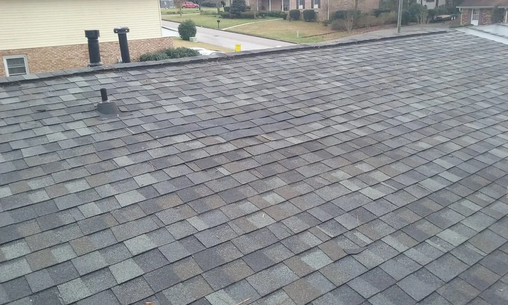 Slide of Masters Roofing